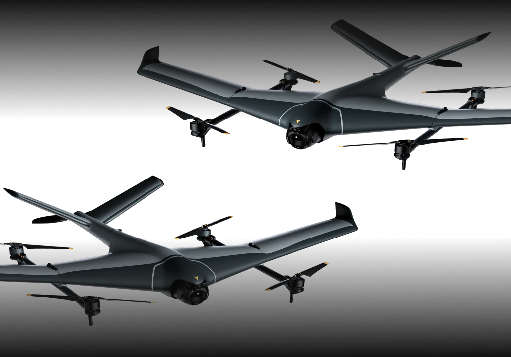 A side-on shot of two sleek drones